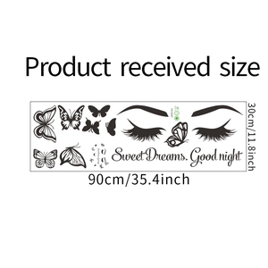 Detail view of Sweet Dreams wall decal with butterfly and eyelash designs on white background