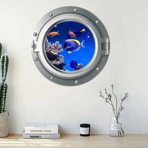 3D porthole wall sticker showing underwater world with tropical fish in a modern bedroom