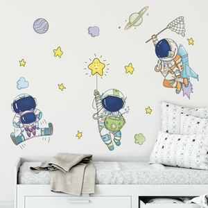 Cartoon astronaut and stars PVC wall stickers for a cozy nursery or kids room decor