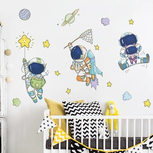Cute cartoon astronaut wall decals with stars and planets for nursery room decoration
