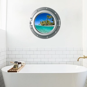 Nautical porthole wall decal showing tropical beach view in a modern white bathroom