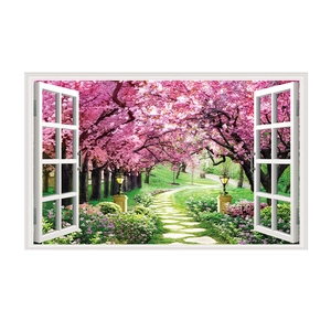 Detail view of 3D window wall sticker with blooming pink cherry blossoms and stone path