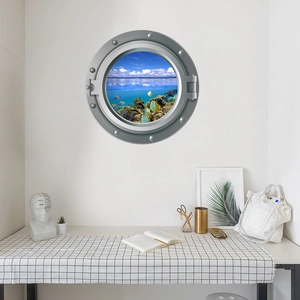 Detail view of 3D porthole wall decal showing vibrant tropical fish and coral reef scene