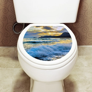 Waterproof toilet lid sticker featuring a tropical sunset beach and ocean waves landscape