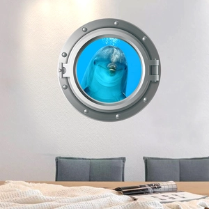 Detail of 3D porthole wall sticker featuring a dolphin swimming in clear blue ocean water