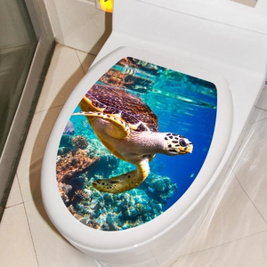 Detail of 3D ocean toilet lid sticker with realistic sea turtle and coral reef scene