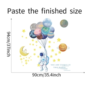 Finished wall sticker layout of cartoon astronaut and moon with dimensions 94x90cm