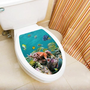 Detail view of marine world toilet cover sticker featuring coral reefs and tropical fish
