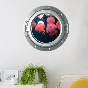 3D porthole wall decal featuring luminous pink jellyfish in an underwater ocean view