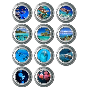Set of 11 self-adhesive ocean porthole wall decals featuring turtles and dolphins