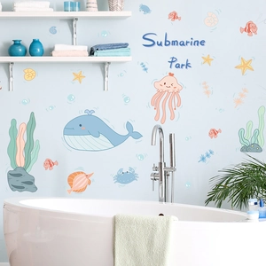 Detailed view of ocean theme wall stickers with whale and jellyfish in a bathroom