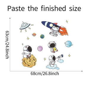 Cartoon astronaut and rocket wall sticker display showing product dimensions and layout