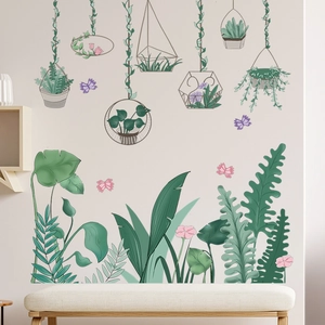 Detail of tropical monstera leaves and geometric hanging planters wall stickers for home decor