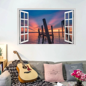 Detail view of 3D fake window wall sticker featuring a sunset ocean and pier scenery