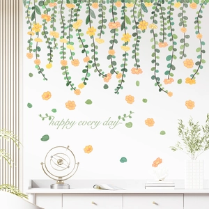 Self-adhesive green vine wall decals with yellow flowers and Happy Every Day text decor