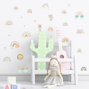 Pastel rainbow animal wall decals for kids room with cartoon lion and giraffe designs