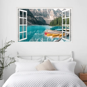 Detail of 3D window wall sticker featuring snow mountains and a lake for bedroom decor
