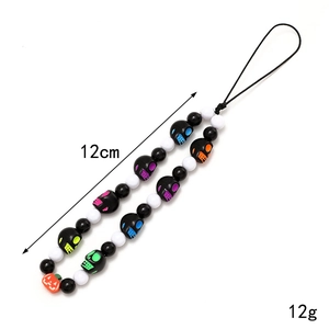 Halloween beaded phone strap with skull and pumpkin charms, 12cm length and 12g weight