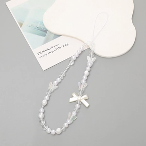 White beaded phone wrist strap with iridescent butterfly charms and bow decoration