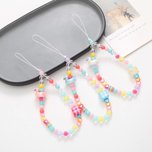 Three-piece colorful beaded phone charms set with heart beads and small duck pendants