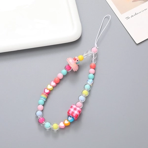 Pastel beaded phone strap with pink duck charm and checkerboard beads on gray backdrop