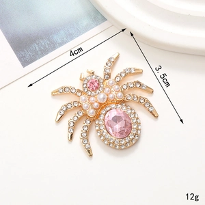 Spilla a ragno con gemma rosa e cristalli bianchi, lega di zinco, misura 4cm x 3,5cm