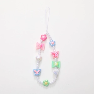 Lanière de téléphone perlée avec fleurs et papillons colorés aux tons macaron