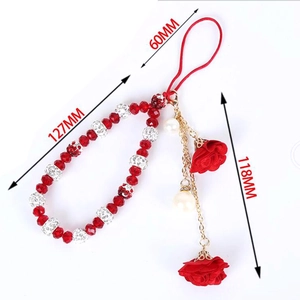 Dragonne de téléphone en perles de cristal rouge avec fleurs et chaîne dorée