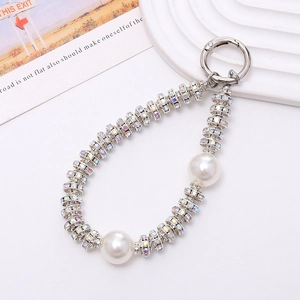 Elegant phone charm featuring silver beads, sparkling AB rhinestones and white pearls