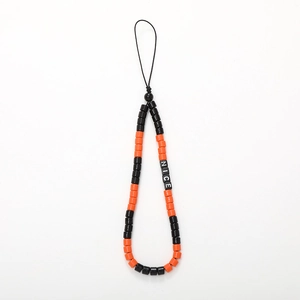 Beaded phone strap with black and orange beads and white NICE letter charms