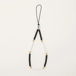 Handmade Evil Eye phone charm with black and white Heishi beads and golden accents