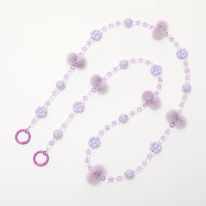 Lavender flower beaded long strap with purple faux fur pom poms and metal spring rings