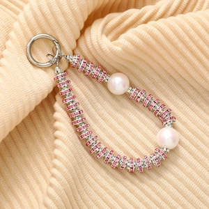 Handmade beaded phone strap with pink rhinestones and elegant white pearls for women