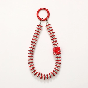 Luxurious red rhinestone phone chain strap with sparkling dice charm and spring clasp