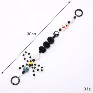 Chaîne de perles avec fleur blanche, breloque chat et boules en peluche noires, 30cm strap