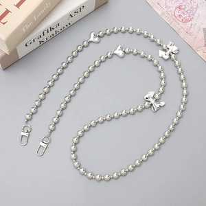 Silver bead crossbody bag chain strap with heart and bow accents and lobster clasps