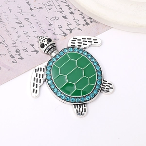 Exquisite silver alloy sea turtle pendant with green enamel and blue rhinestones