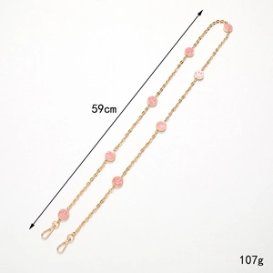 Pink smiley face charm chain with golden lobster clasps for crossbody bags and glasses