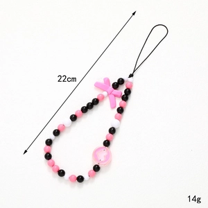 Pink and black beaded phone charm with bow and heart, 22cm long and 14g lightweight