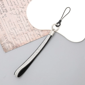 Luxury rhinestone phone strap with black suede band and sparkling silver crystals