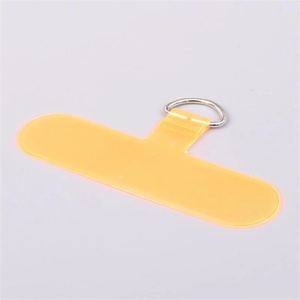 Close-up of translucent fluorescent yellow phone tether tab with silver metal D-ring attachment