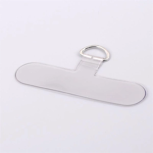 Detail view of transparent TPU phone tether tab with silver metal D-ring attachment