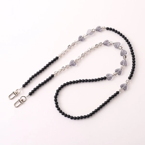 Crossbody phone lanyard with black beads, transparent squares and grey hearts