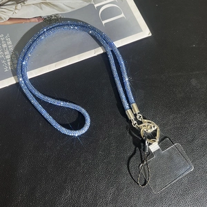 Blue rhinestone crossbody phone strap with silver clasp and clear case insert card
