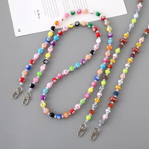 Colorful sports and billiard bead phone charms featuring diverse balls and acrylic numbers