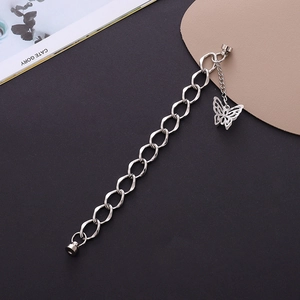 Silver metal chain bracelet with hollow butterfly pendant and round magnetic clasp