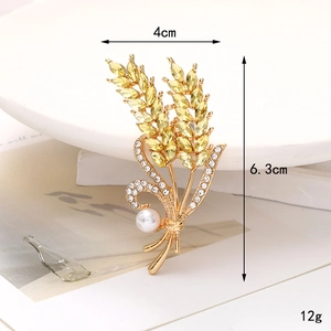 Golden wheat ear brooch with yellow crystals and pearl detail, size 4cm by 6.3cm