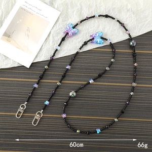 Lanière de téléphone chic avec perles papillon noires et irisées, sangle de 60 cm