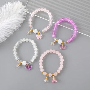 Bracelets de perles colorés avec breloques papillon et fleurs en résine et verre