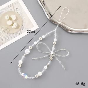 Handmade beaded phone strap with pearls, silver stars and a chic bow knot, 22cm long